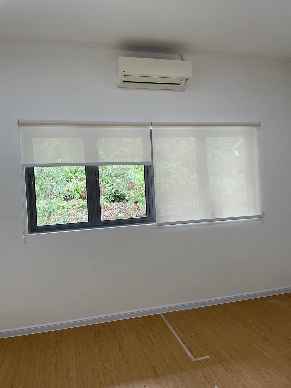 Blackout roller blinds for a bedroom, providing full privacy